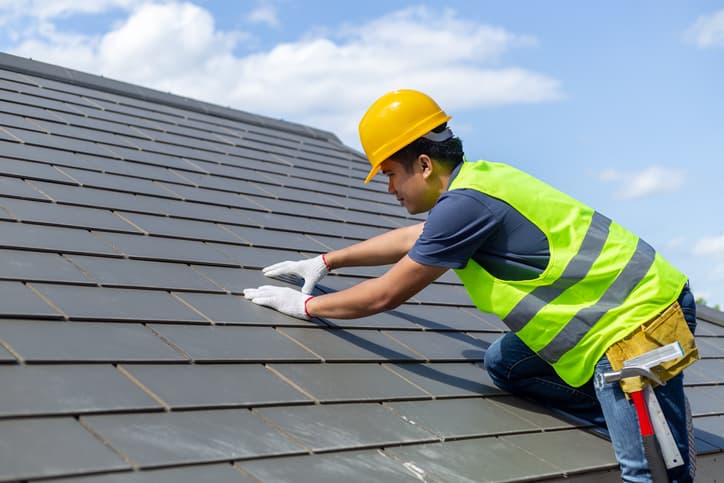 JBL Roofing crew repairing a shingle roof